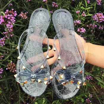 Quente 2021 Moda Mulher Flip-Flops Sapatos de Verão Fresco Praia Rebites grande arco sandálias de Marca de sandálias jelly shoes meninas tamanho 36-42